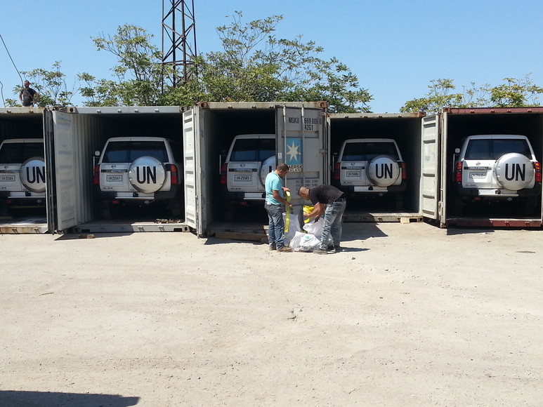 UN 4x4 vehicles loaded in containers for sea re-export